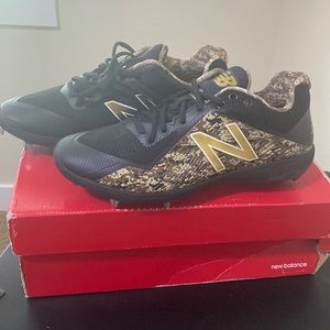 New Balance metal cleats